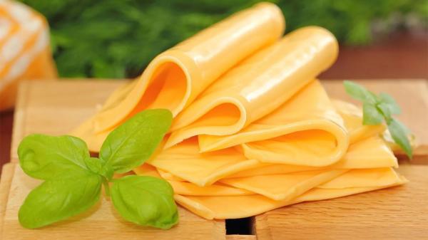پنیر پروسس چیست ؟ ، از نحوه تولید تا مزایا، خواص و کاربرد
